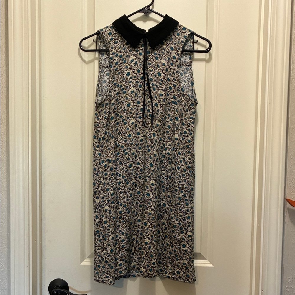 Floral Sleeveless Dress with Black Collar fits like a small